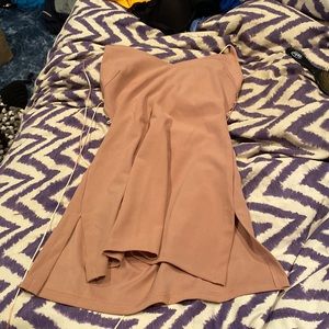 Light pink tight ish mini dress with adjustable tie straps